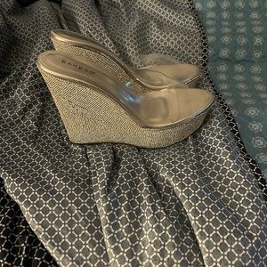Silver wedge crystal heels never been worn.